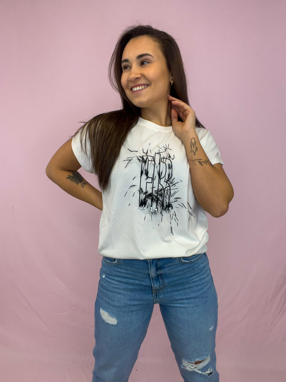 T SHIRT COM PLUMAS
